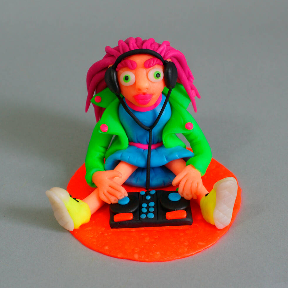 Handmade plastic figurine made of fluorescent polymer clay (thermoplastic) or "FIMO".