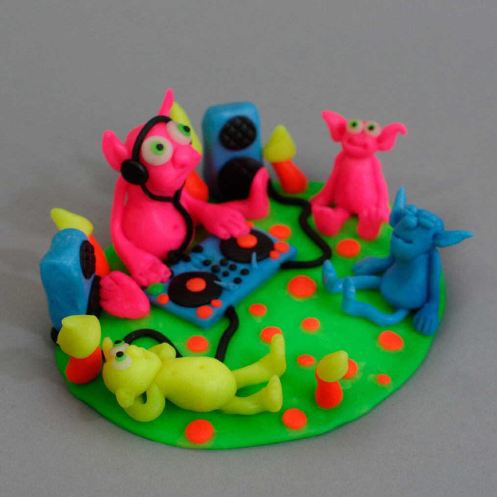 Handmade plastic figurine made of fluorescent polymer clay (thermoplastic) or "FIMO".