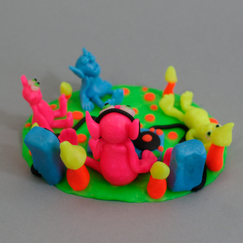 Handmade plastic figurine made of fluorescent polymer clay (thermoplastic) or "FIMO".