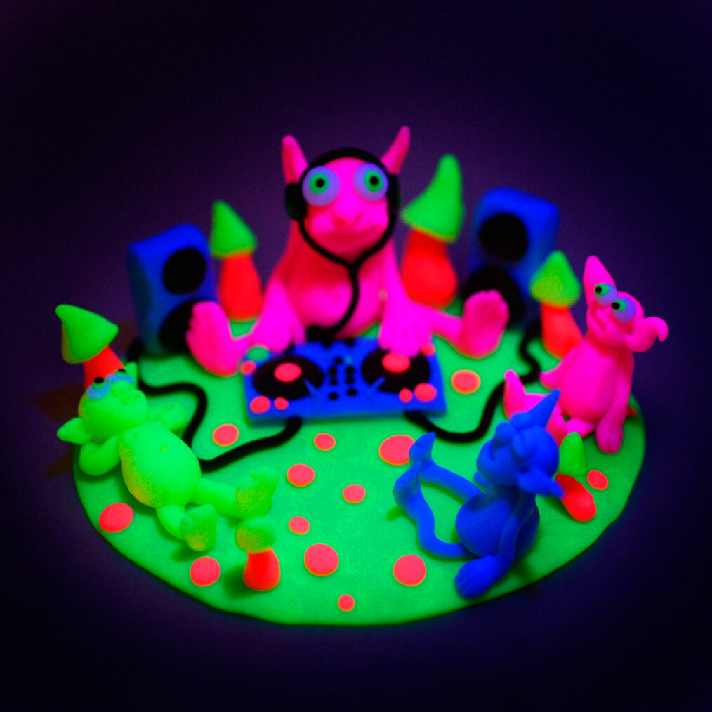 Handmade plastic figurine made of fluorescent polymer clay (thermoplastic) or "FIMO".