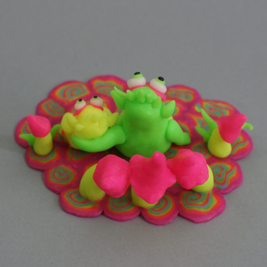 Handmade plastic figurine made of fluorescent polymer clay (thermoplastic) or "FIMO".